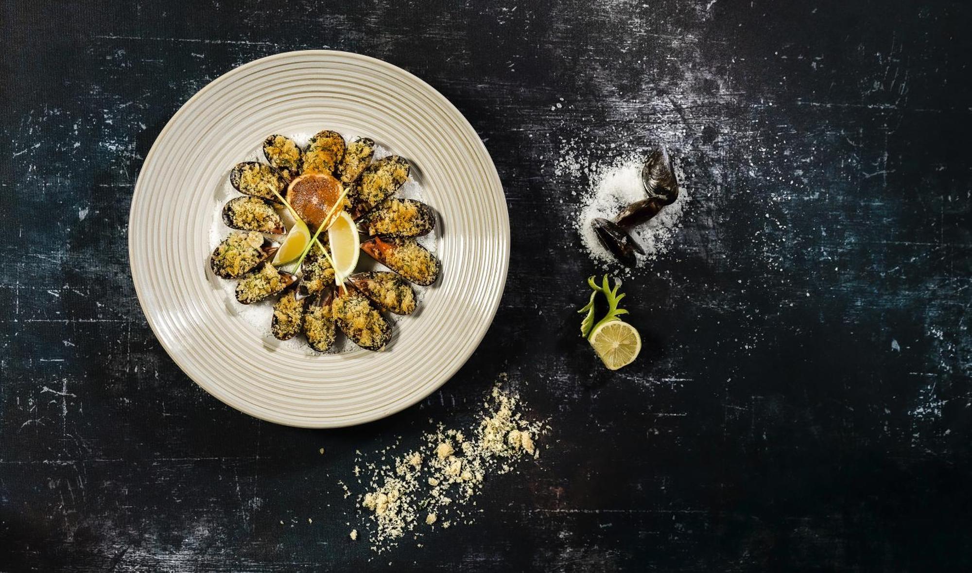 Moevenpick Resort & Marine Spa Susa Esterno foto A plate of grilled scallops