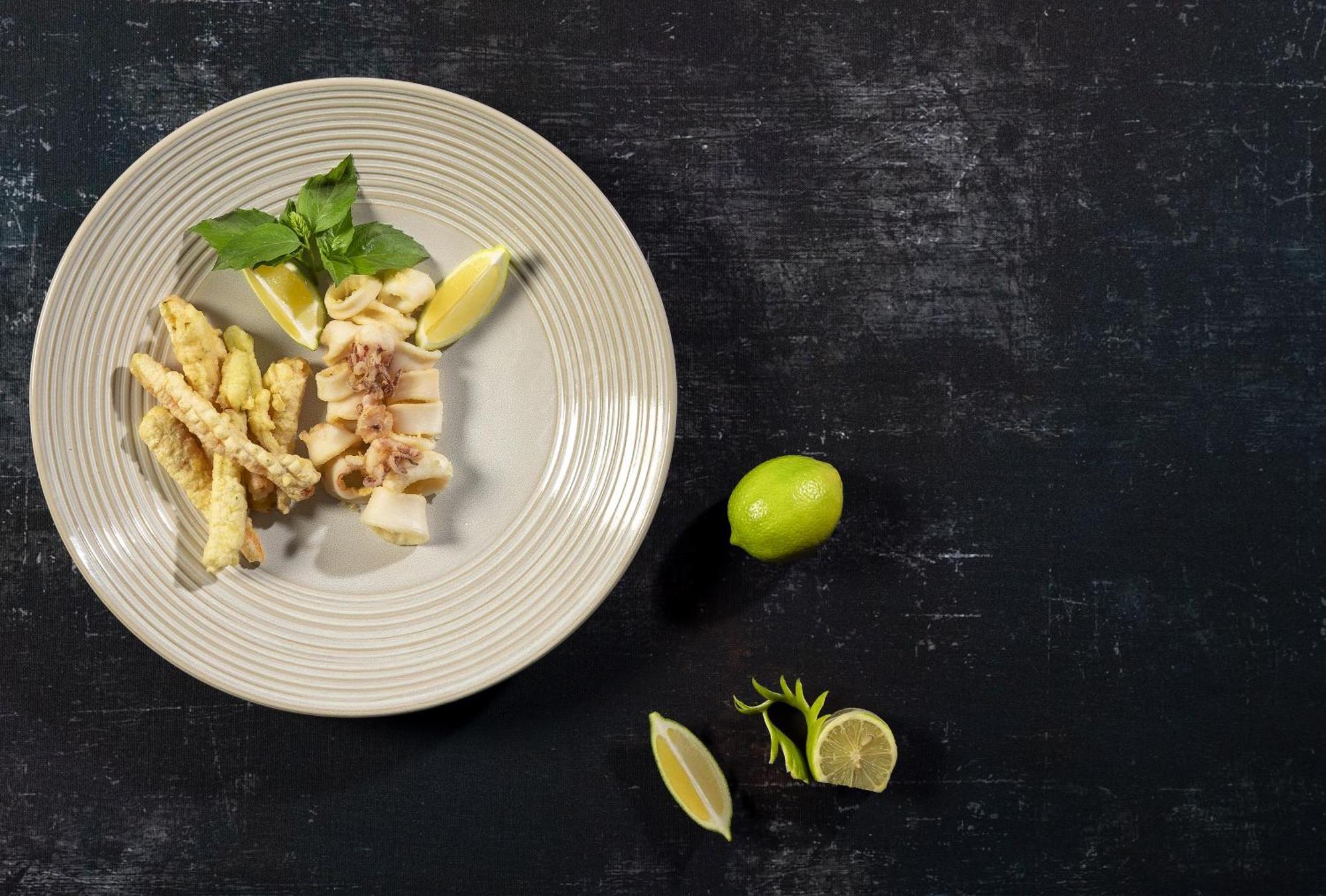 Moevenpick Resort & Marine Spa Susa Esterno foto A plate of raw cuttlefish