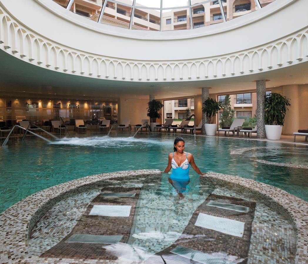 Moevenpick Resort & Marine Spa Susa Esterno foto The pool at the Hilton Mauritius Resort